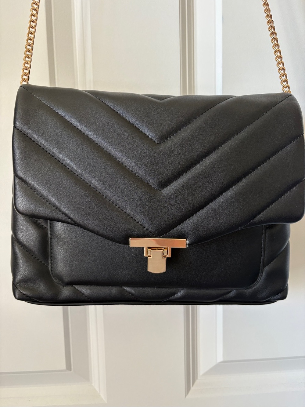 a new day Black Quilted Crossbody with Gold Chain New without tags
